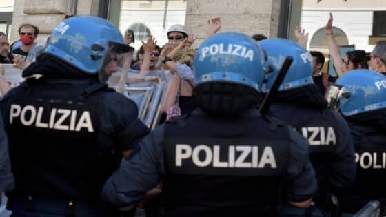 ROME, ITALY - JUNE 27: Tension between protesters and the police that prevents show business workers ( actresses, actors, technicians, musicians, etc.)from leaving the square and making a march in Piazza SS. Apostoli, on June 27, 2020 in Rome, Italy.Show business workers protested, calling for an income that will enable workers in the performing arts, art and culture to overcome the limitations imposed by the protocols for the Covid-19, until the complete and real recovery of the sector and a profound reform of the sector, legal recognition of artistic professions and companies operating in the sector. (Photo by Simona Granati - Corbis/Getty Images,)