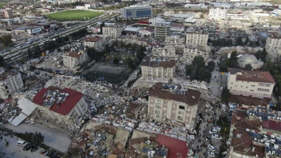 Aerial photo shows the destruction in Hatay city center, southern Turkey, Tuesday, Feb. 7, 2023. Search teams and emergency aid from around the world poured into Turkey and Syria on Tuesday as rescuers working in freezing temperatures dug — sometimes with their bare hands — through the remains of buildings flattened by a magnitude 7.8 earthquake. The death toll soared above 5,000 and was still expected to rise. of collapsed buildings across the region. (IHA via AP)