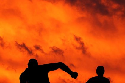 man and woman running silhouette